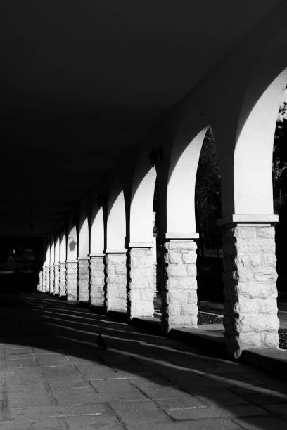 istock Architectural detail of a pattern of concrete pillars, light and shadow 1459060126