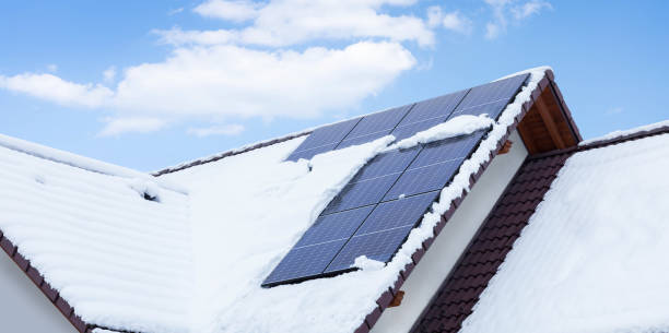 istock solar panels on the roof covered with snow in winter 1459061012