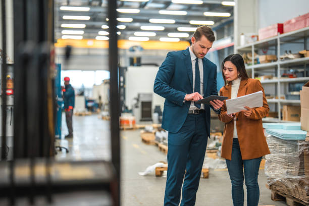 istock Handsome Multicultural Engineers Working In An Industrial Factory 1459062324