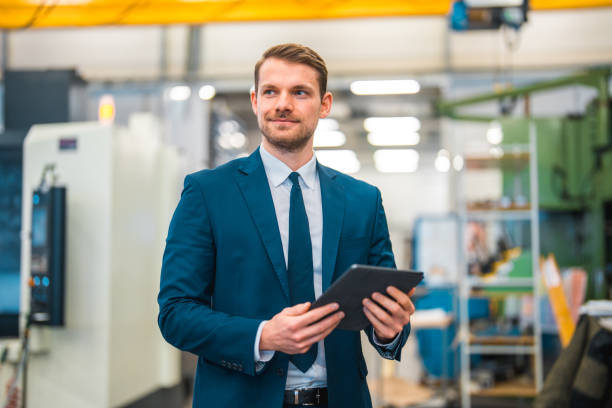 istock Successful Businessman In A Manufacturing Plant 1459063240
