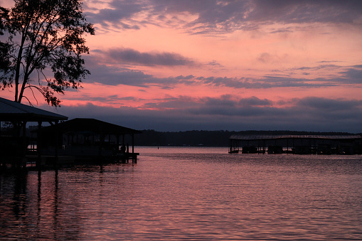 Purple clouds and gold skies are the order of the day in this early morning shot taken on beautiful Lake Sinclair in Milledgeville, Georgia.