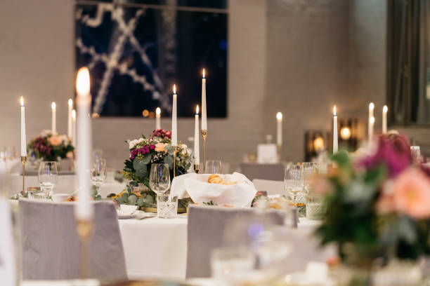 istock modern set wedding tables in a restaurant with white tablecloths and berry colored flowers 1459064378