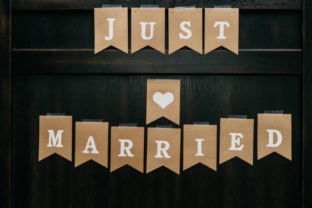 just married lettering on a brown garland