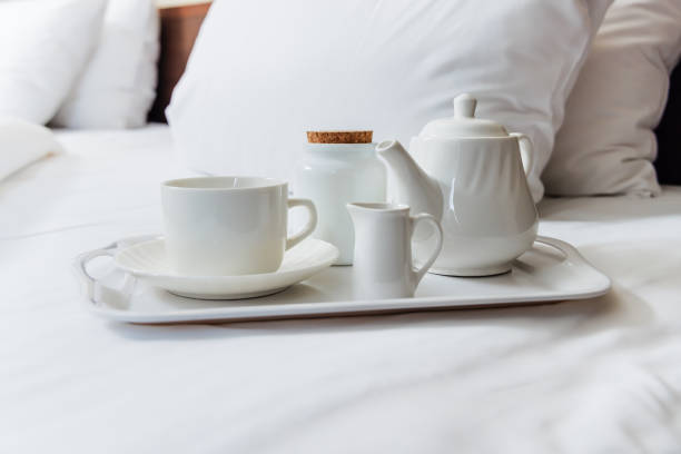 istock Comfortable bed and tea to wake up to 1459066373