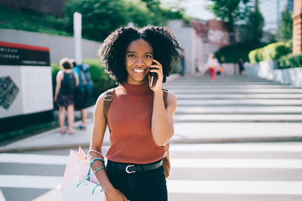 istock African American female talking on cellphone 1459066739