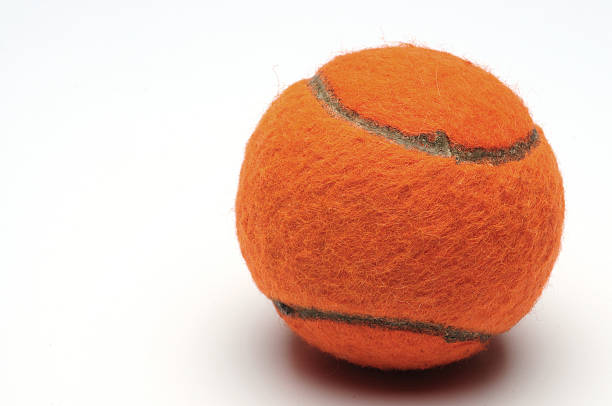 istock ORANGE COLOR TENNIS BALL 145907149