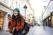 Pretty young female talking on the phone