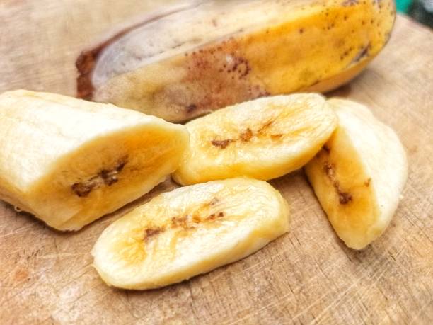 istock banana cut on a cutting board 1459077280