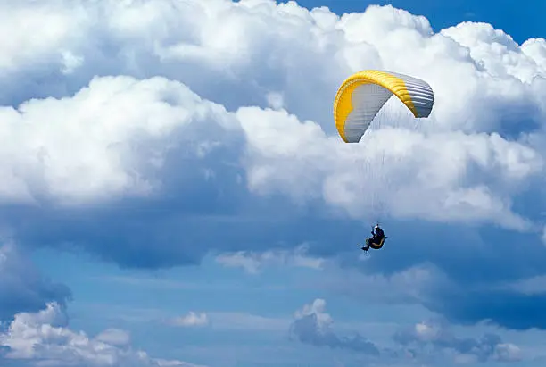 Paragliding with beutiful clouds.