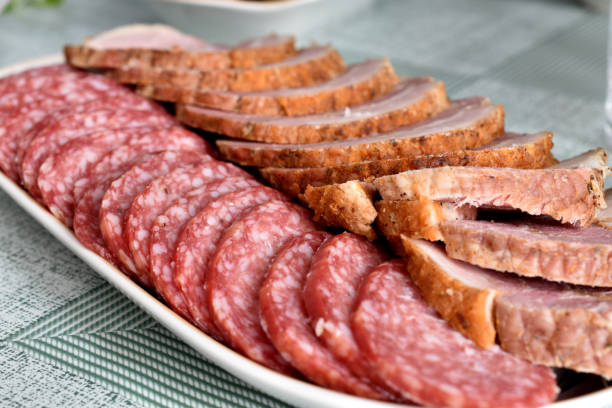 istock Meat cuts lie on a porcelain plate. 1459078371
