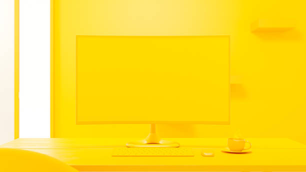 istock Computer Mock-Up yellow color on work desk and cup coffee in yellow room. 1459082352