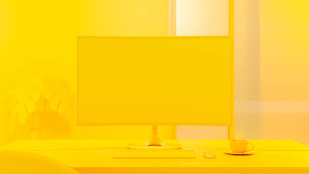 istock Computer Mock-Up yellow color on work desk and cup coffee in yellow room. 1459082353