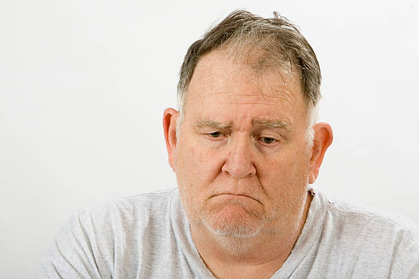 Big guy depressed stock photo