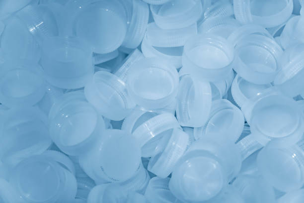 istock The pile of clear plastic bottle caps. 1459083792