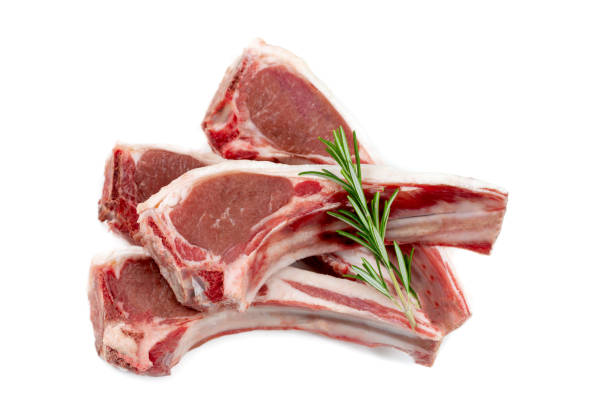 istock Lamb chops in close-up view from above on a cropped white background. 1459085049