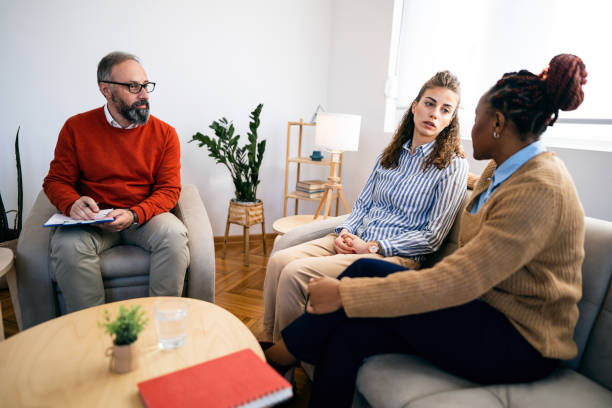 istock Multiracial homosexual couple at the therapy 1459086805
