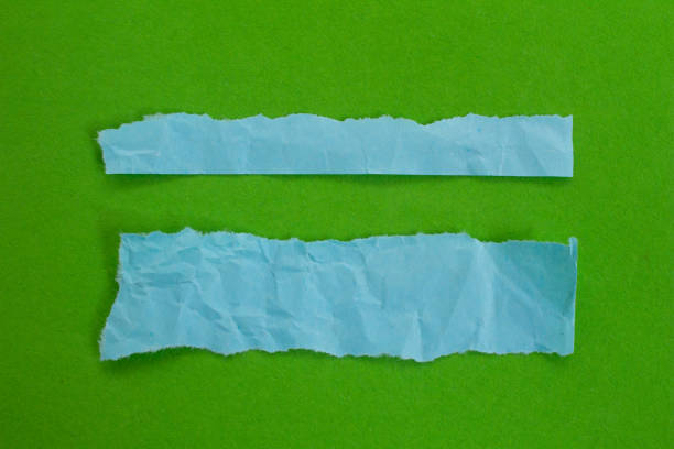 istock Set of blue torn paper isolated on green 1459088605