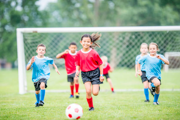 calcio estivo - soccer child indoors little boys foto e immagini stock