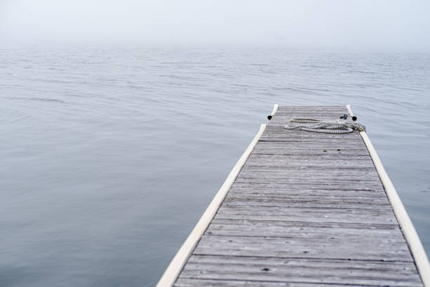 istock Jetty and fog on the lake. 1459090381