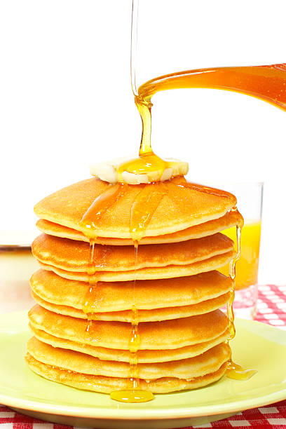 istock Pouring syrup on the pancakes 145909062