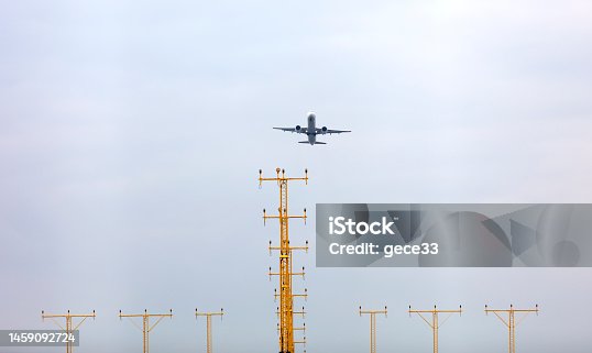 istock Airplane taking on cloud sky 1459092724
