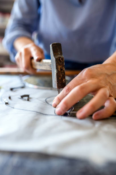istock Glass artist craftswoman working in her studio 1459094872