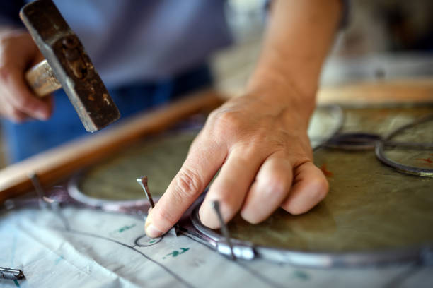 istock Glass artist craftswoman working in her studio 1459095059