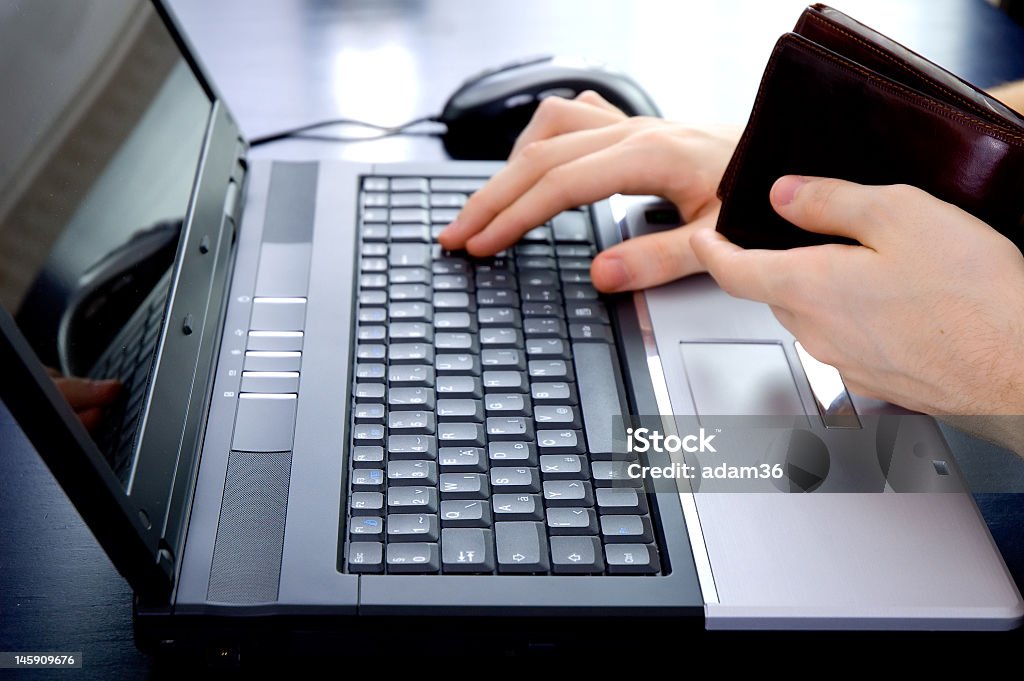 Online payment Online payment: paying with wallet in hand Banking Stock Photo