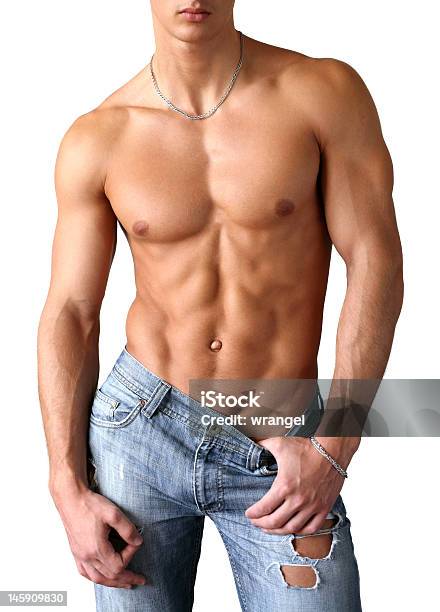 A Topless Muscular Man Wearing Tattered Jeans Stock Photo - Download Image Now - Abdominal Muscle, Active Lifestyle, Adult