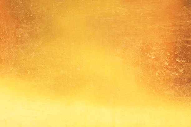 istock Gold background or texture dirty dry water stains abstract   distress  scratch and gradients shadow. 1459102870