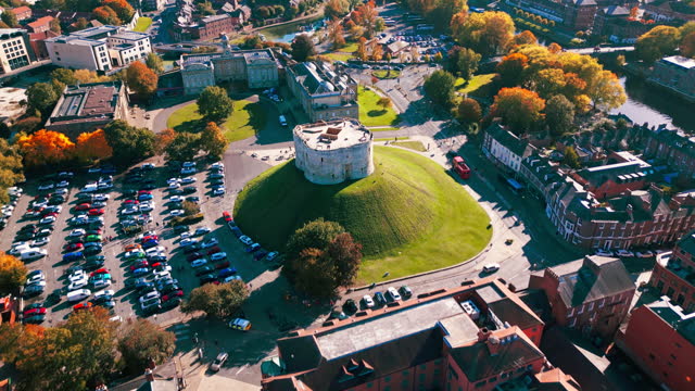 Aerial view Real time Footage of above York Clifford's Tower can see York Minster Cathedral