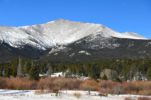 Allenspark, CO, USA, January 23, 2023: Mt Meeker is covered in Light Snow in Rocky Mountain National Park.