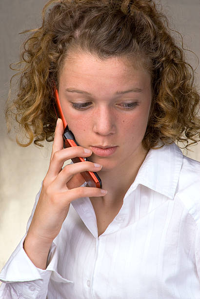 Young Girl on Mobile Phone stock photo