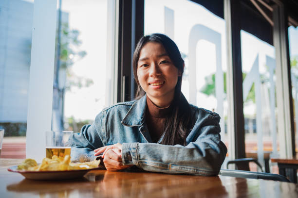 istock Happy asian young woman looking at camera 1459111953