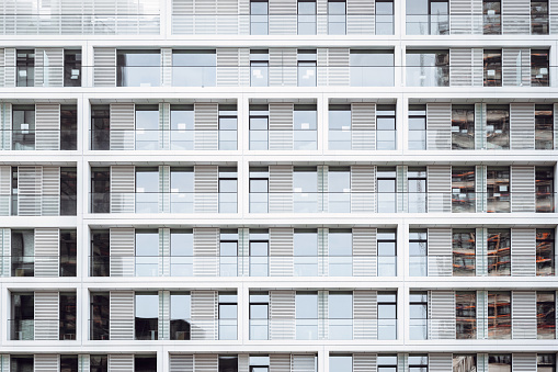 facade of new white residential house in berlin