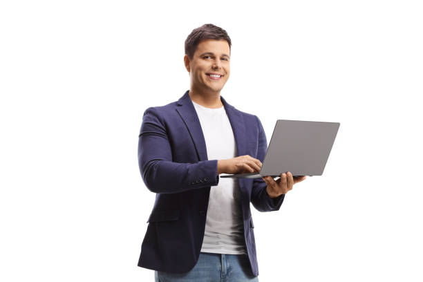 istock Man holding an open laptop computer and smiling at camera 1459116241