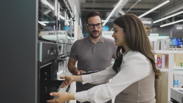 Customer at home appliances and electronics store