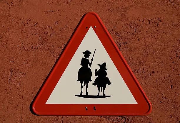 Photo of Don Quijote and Sancho Panza silhouette in Traffic Sing