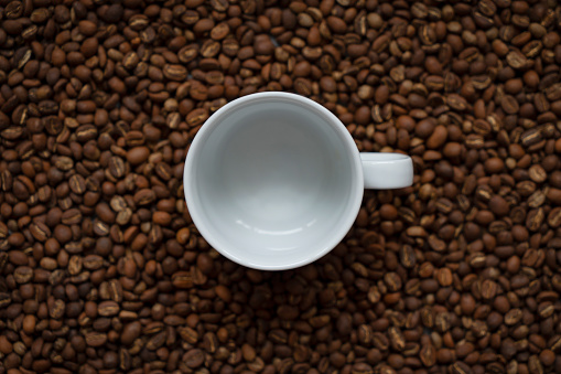 Coffee cup and coffee beans