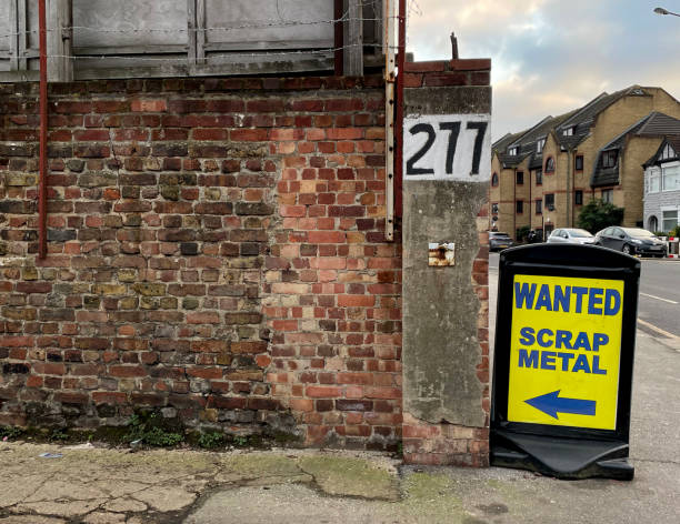 Scrap Metal sign Scrap yard sign in a street in Walthamstow London purchase of steel scrap stock pictures, royalty-free photos & images