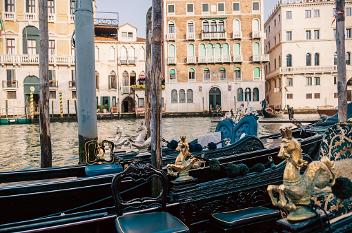 Gondolas on a canal in Venice in Italy