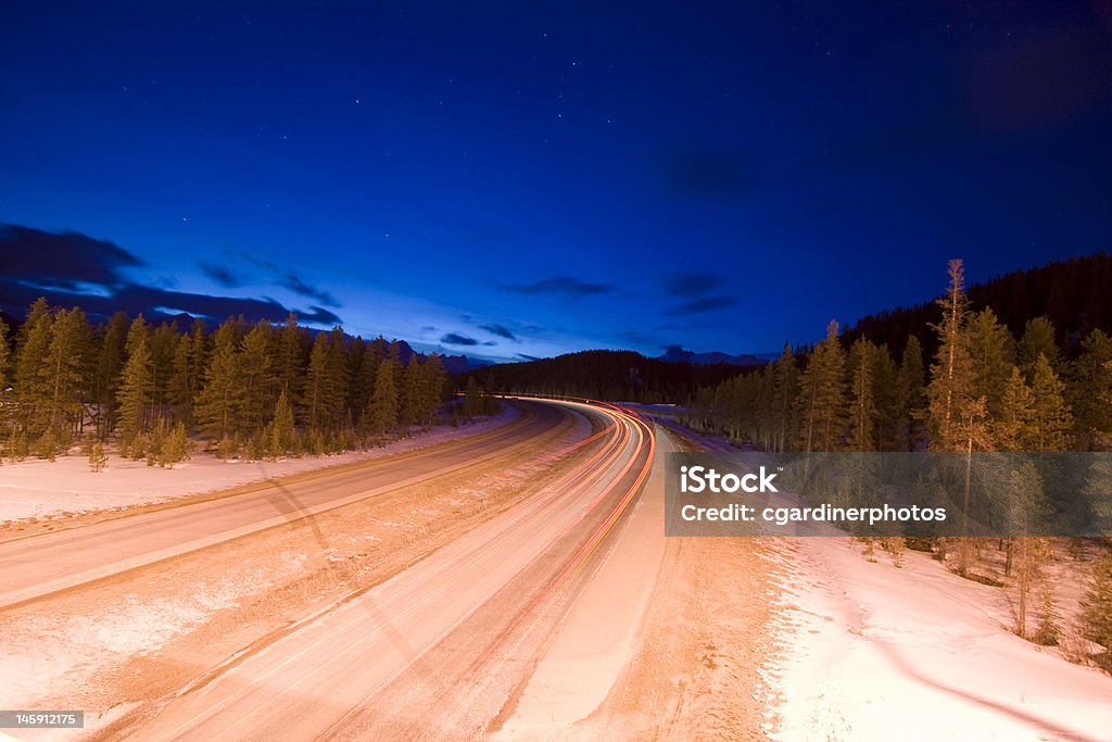 Highway at Dusk wide angle view of highway at dusk with a wide angle lens on a long exposure Alberta Stock Photo