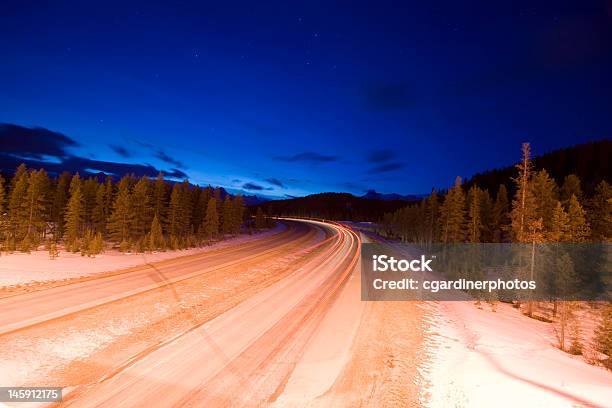 Highway At Dusk Stock Photo - Download Image Now - Alberta, Banff, Banff National Park