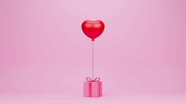 istock pink gife box with red heart balloon on pink backdrop.3d render 1459121769