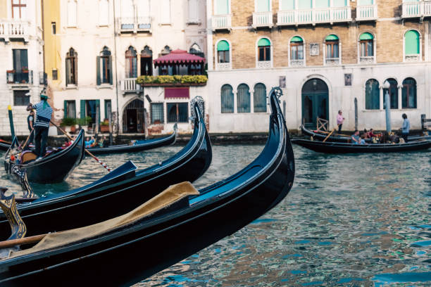 istock Gondolas on a canal in Venice in Italy 1459122231