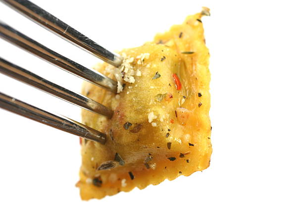 Ravioli on a fork stock photo