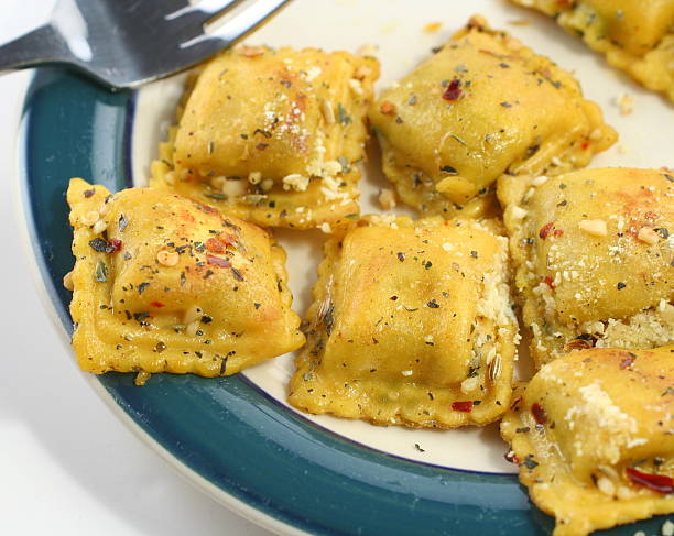 Ravioli on a plate stock photo