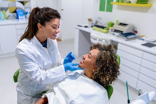 Woman having dental check-up at dentist's office