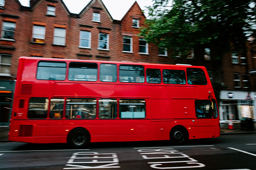 Edinburgh tour bus in the cue to pick up tourists for a round trip through the streets of Edinburgh, Scotland.