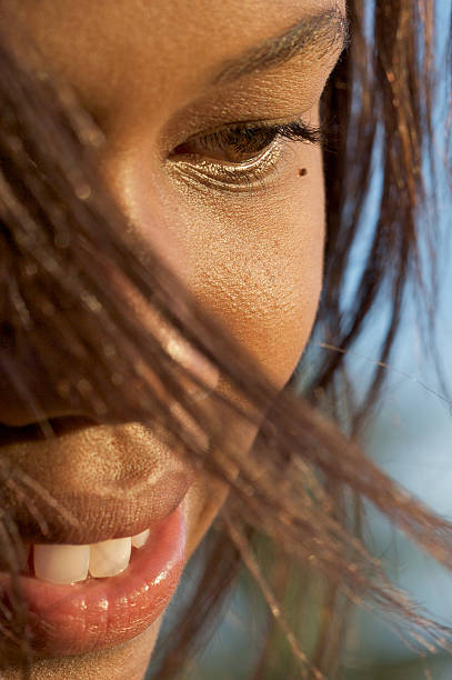 istock woman with a beautiful sunny smile 145912681